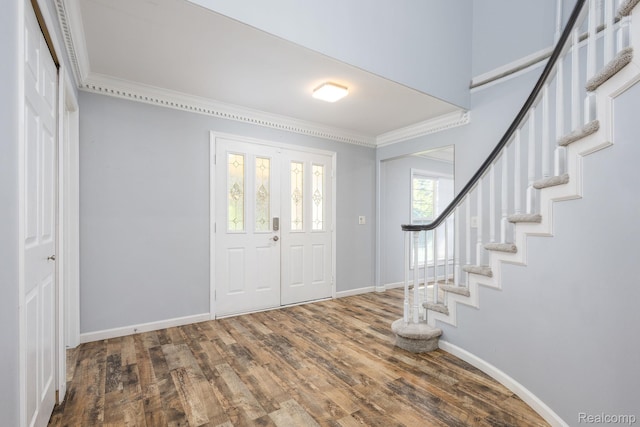 667 Heritage Ln, Rochester, MI 48309 - entryway featuring wood finished floors, crown molding, baseboards, and stairs