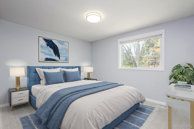 667 Heritage Ln, Rochester, MI 48309 - bedroom featuring baseboards and light wood finished floors