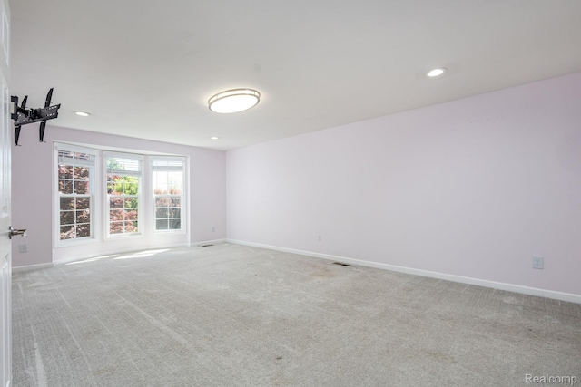 667 Heritage Ln, Rochester, MI 48309 - unfurnished room featuring light colored carpet, baseboards, and recessed lighting