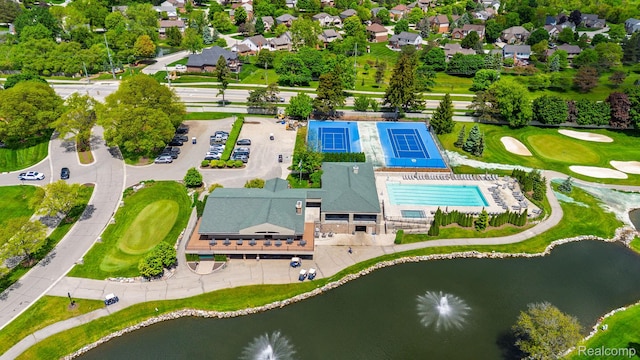 667 Heritage Ln, Rochester, MI 48309 - drone / aerial view of a large body of water and a local golf course