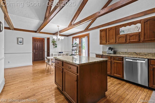 3430 Woodvalley Dr, Lapeer, MI 48446 - kitchen with stainless steel dishwasher, decorative backsplash, a chandelier, beam ceiling, and light wood finished floors