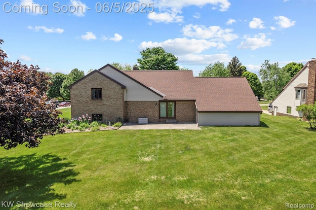 3430 Woodvalley Dr, Lapeer, MI 48446 - back of property with a patio area, brick siding, and a yard