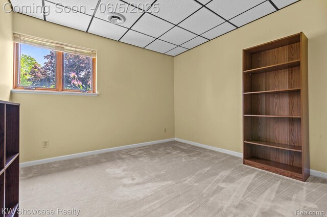 3430 Woodvalley Dr, Lapeer, MI 48446 - empty room with carpet, a paneled ceiling, and baseboards