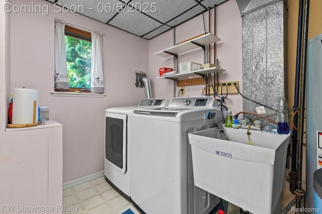 3430 Woodvalley Dr, Lapeer, MI 48446 - washroom featuring washer and clothes dryer, light floors, and baseboards