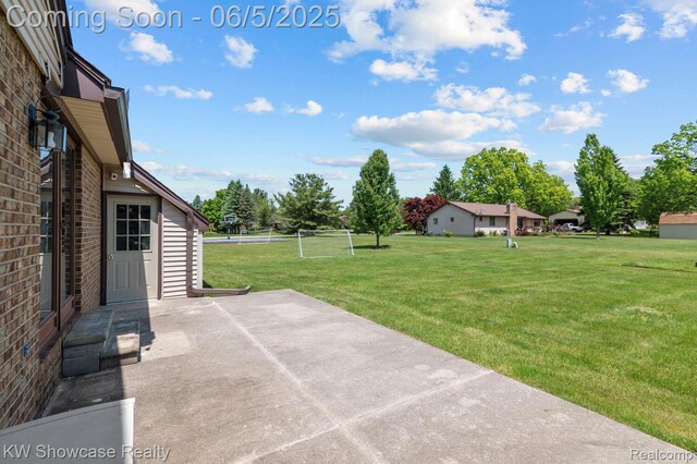 3430 Woodvalley Dr, Lapeer, MI 48446 - view of patio with a sport area