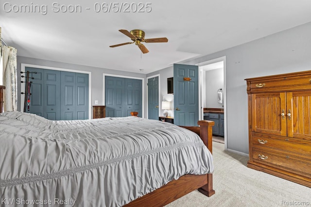 3430 Woodvalley Dr, Lapeer, MI 48446 - bedroom with carpet flooring, two closets, ceiling fan, baseboards, and ensuite bathroom
