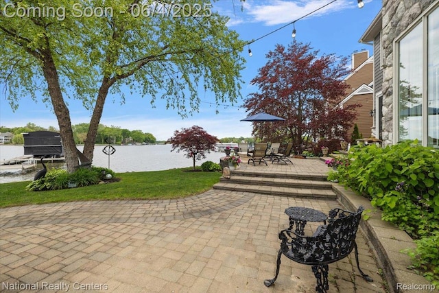 3448 Circle Dr, Commerce Twp, MI 48382 - view of patio / terrace featuring a water view and outdoor dining area