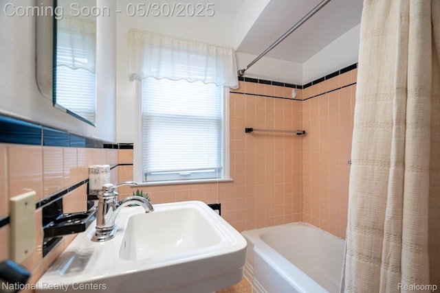 2029 Hubbell St, Dearborn, MI 48128 - bathroom with shower / bathtub combination with curtain, a sink, and tile walls