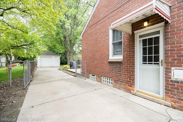 2029 Hubbell St, Dearborn, MI 48128 - view of property exterior featuring concrete driveway, a garage, an outdoor structure, and brick siding