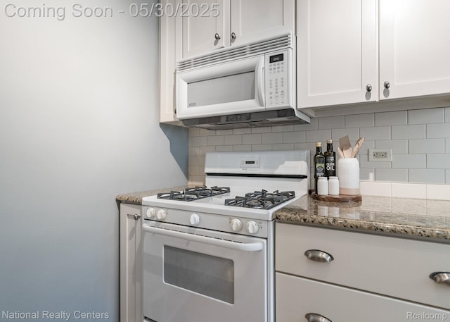 2029 Hubbell St, Dearborn, MI 48128 - kitchen featuring white appliances, decorative backsplash, white cabinetry, and light stone countertops