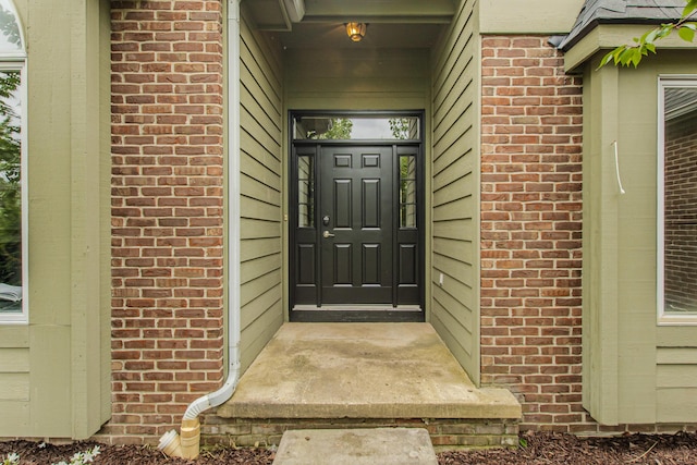9117 Cambridge Dr, Saline, MI 48176 - property entrance with brick siding