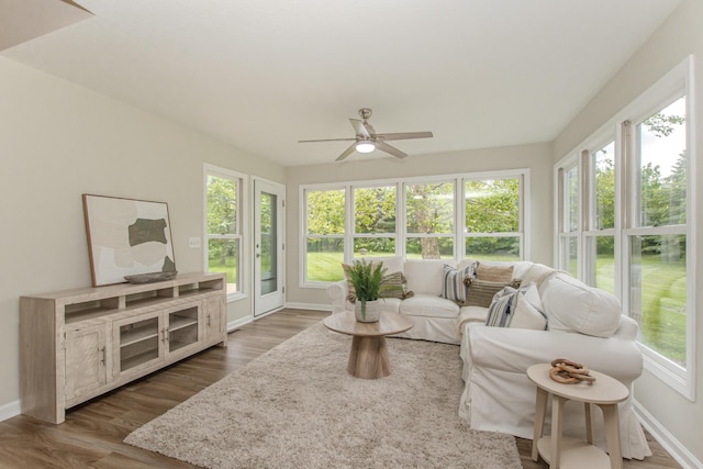 9117 Cambridge Dr, Saline, MI 48176 - sunroom with plenty of natural light, baseboards, wood finished floors, and french doors