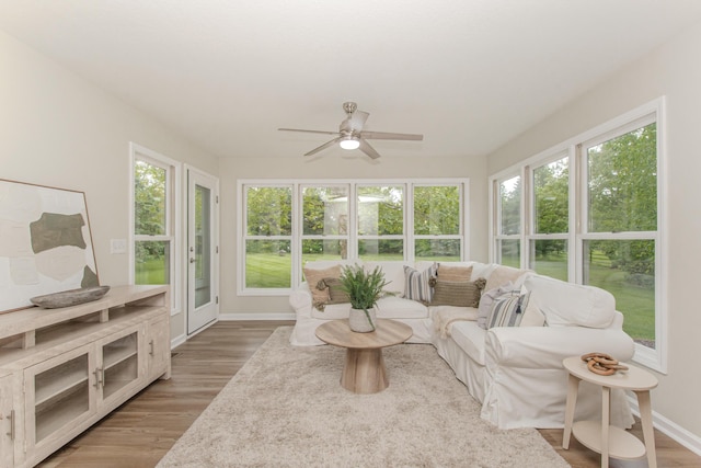 9117 Cambridge Dr, Saline, MI 48176 - sunroom / solarium featuring healthy amount of natural light, wood finished floors, and baseboards