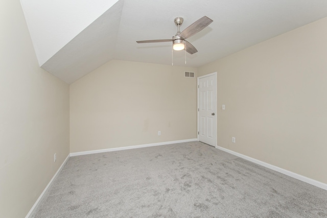 9117 Cambridge Dr, Saline, MI 48176 - additional living space with carpet, vaulted ceiling, ceiling fan, and baseboards