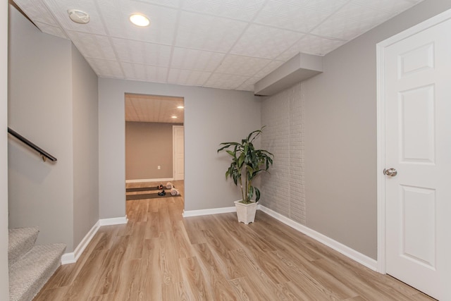 9117 Cambridge Dr, Saline, MI 48176 - corridor with light wood-style floors, stairway, baseboards, and recessed lighting