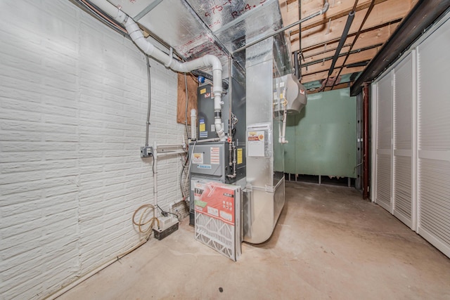 9117 Cambridge Dr, Saline, MI 48176 - unfinished below grade area with brick wall