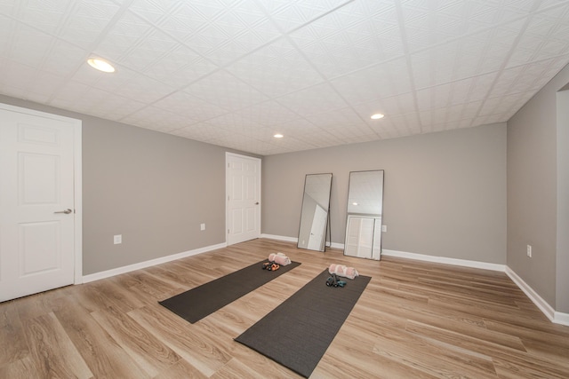 9117 Cambridge Dr, Saline, MI 48176 - workout area with recessed lighting, light wood finished floors, and baseboards