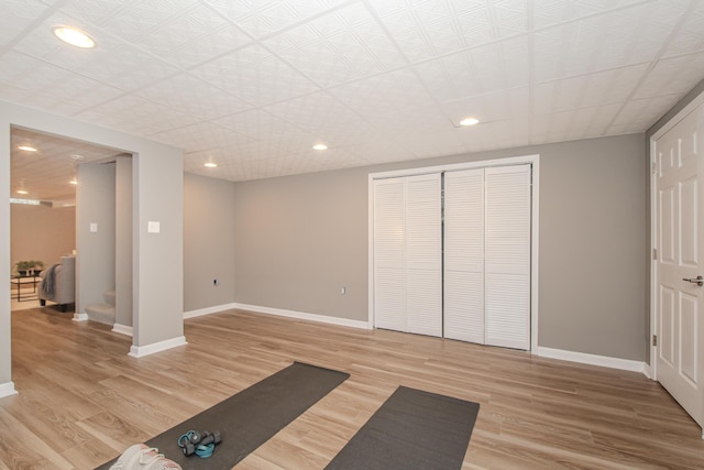 9117 Cambridge Dr, Saline, MI 48176 - workout area with light wood-type flooring, baseboards, and recessed lighting