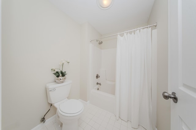9117 Cambridge Dr, Saline, MI 48176 - bathroom featuring toilet, tile patterned flooring, shower / bathtub combination with curtain, and baseboards