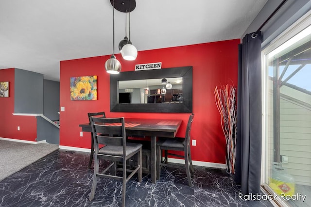 184 Dana Ln, Sand Lake, MI 49343 - dining room featuring marble tiled flooring and baseboards