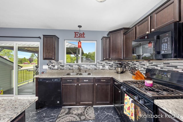 184 Dana Ln, Sand Lake, MI 49343 - kitchen with black appliances, a sink, dark marble finish flooring, decorative backsplash, and dark brown cabinetry
