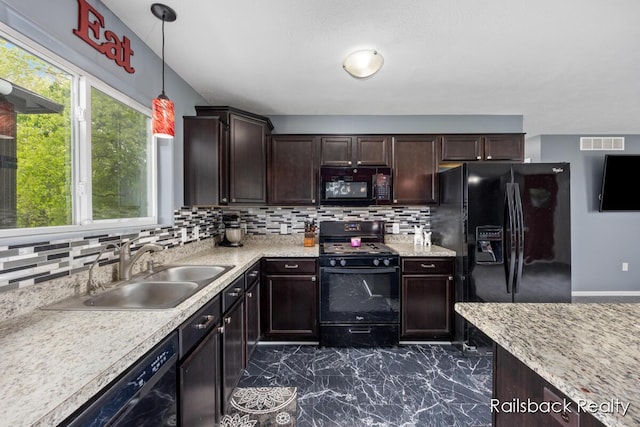 184 Dana Ln, Sand Lake, MI 49343 - kitchen with black appliances, a sink, decorative backsplash, and dark brown cabinets