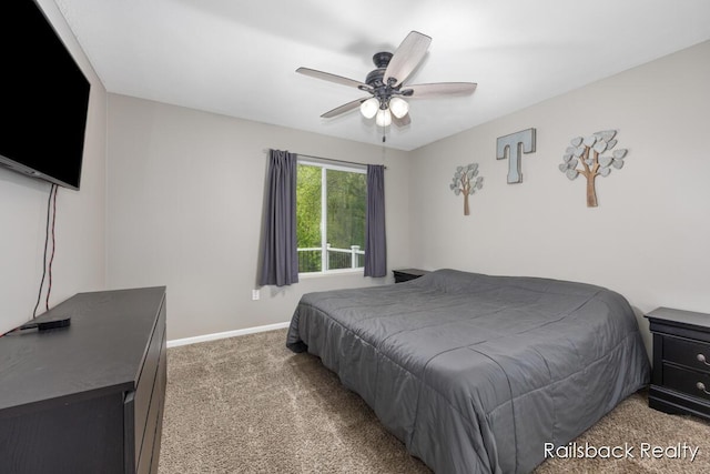 184 Dana Ln, Sand Lake, MI 49343 - carpeted bedroom featuring baseboards and ceiling fan