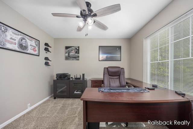184 Dana Ln, Sand Lake, MI 49343 - office area featuring carpet flooring, a ceiling fan, and baseboards