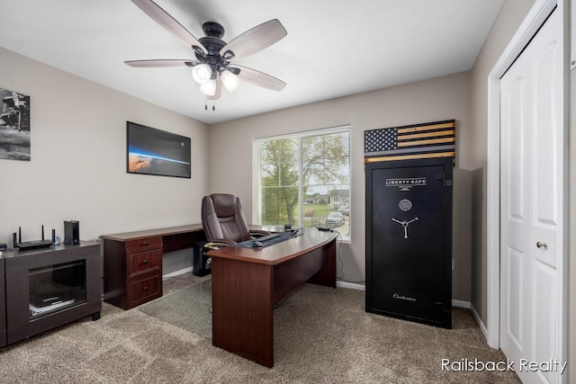 184 Dana Ln, Sand Lake, MI 49343 - carpeted office space with a ceiling fan and baseboards