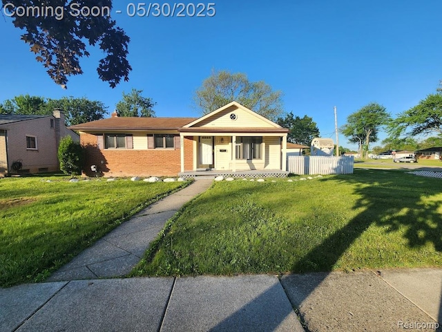 2625 Winston Dr, Sterling Heights, MI 48310 - ranch-style house with brick siding, covered porch, and a chimney