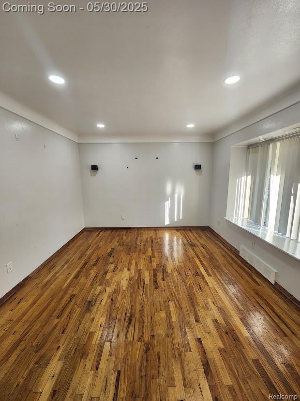 2625 Winston Dr, Sterling Heights, MI 48310 - unfurnished room with hardwood / wood-style floors, recessed lighting, and ornamental molding