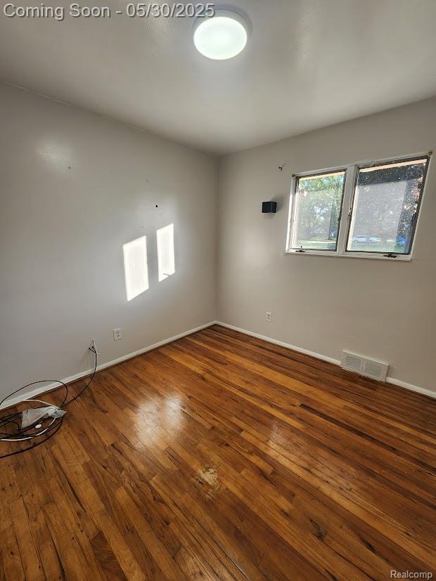 2625 Winston Dr, Sterling Heights, MI 48310 - empty room featuring hardwood / wood-style floors and baseboards