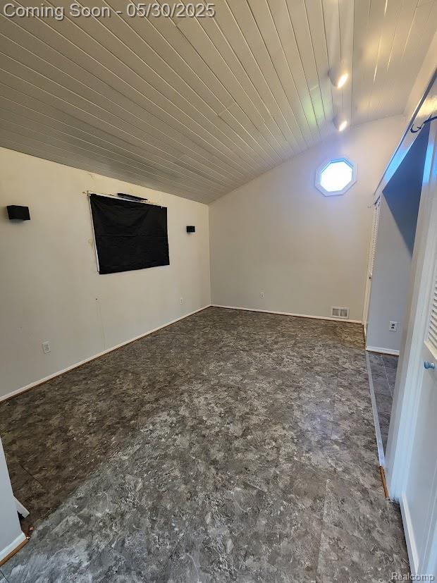 2625 Winston Dr, Sterling Heights, MI 48310 - empty room featuring vaulted ceiling