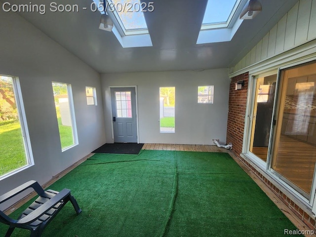 2625 Winston Dr, Sterling Heights, MI 48310 - unfurnished sunroom featuring lofted ceiling and a skylight