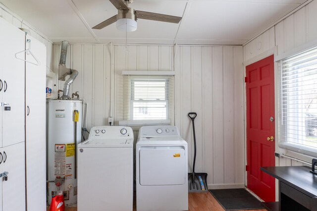 23067 Stauber Ave, Hazel Park, MI 48030 - laundry room with water heater, ceiling fan, washing machine and clothes dryer, and wood finished floors