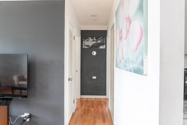 23067 Stauber Ave, Hazel Park, MI 48030 - hallway featuring light wood-style floors and baseboards