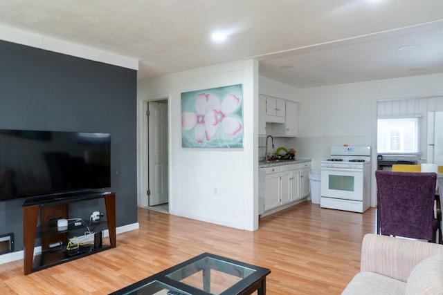 23067 Stauber Ave, Hazel Park, MI 48030 - living area with light wood-type flooring and baseboards