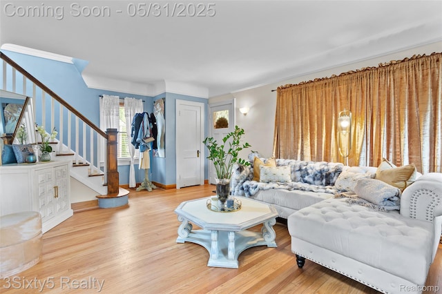 6568 Balfour Ave, Allen Park, MI 48101 - living area with stairway, crown molding, wood finished floors, and baseboards