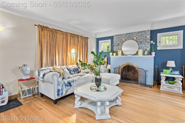 6568 Balfour Ave, Allen Park, MI 48101 - living room with a fireplace, wood finished floors, and ornamental molding