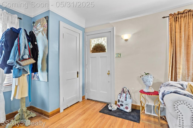 6568 Balfour Ave, Allen Park, MI 48101 - foyer with light wood-type flooring, baseboards, and crown molding