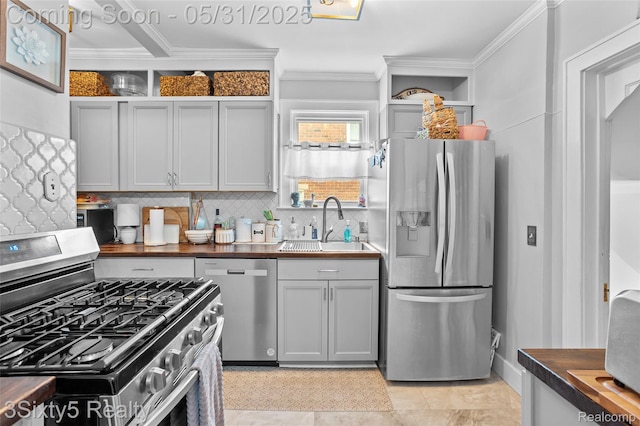 6568 Balfour Ave, Allen Park, MI 48101 - kitchen featuring stainless steel appliances, butcher block countertops, a sink, ornamental molding, and open shelves