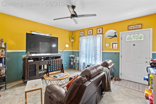 6568 Balfour Ave, Allen Park, MI 48101 - living area featuring ceiling fan, healthy amount of natural light, and a wainscoted wall