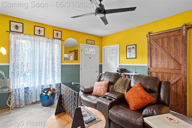 6568 Balfour Ave, Allen Park, MI 48101 - living area with ceiling fan, a barn door, and carpet floors