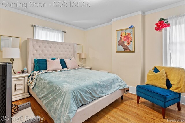 6568 Balfour Ave, Allen Park, MI 48101 - bedroom featuring crown molding, wood finished floors, and baseboards