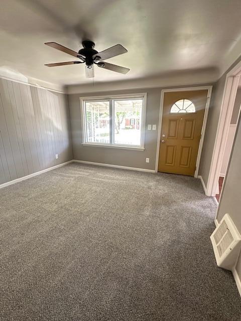 1858 Leblanc St, Lincoln Park, MI 48146 - entryway with a ceiling fan, carpet flooring, and baseboards
