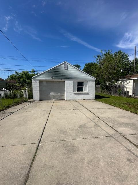 1858 Leblanc St, Lincoln Park, MI 48146 - detached garage featuring concrete driveway