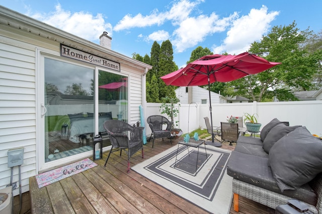 912 Gerald Ave, Jackson, MI 49203 - wooden deck with outdoor dining area