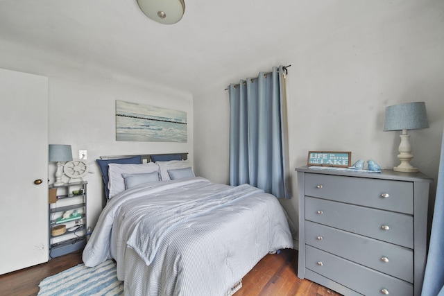 912 Gerald Ave, Jackson, MI 49203 - bedroom featuring dark wood-type flooring