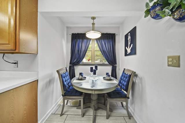 912 Gerald Ave, Jackson, MI 49203 - dining room with baseboards and light tile patterned floors