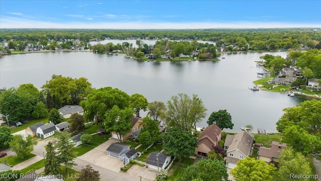 8569 Cooley Beach Dr, White Lake, MI 48386 - aerial view of residential area featuring a nearby body of water